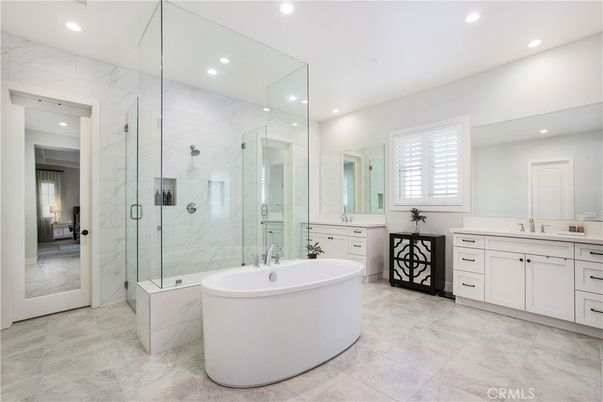 Bathroom, Dual Sink Vanities, Glass Shower, Interior, Marble Walls, Recessed Lighting