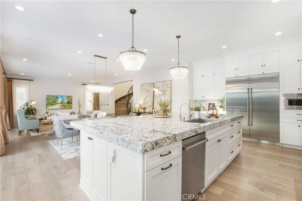 Dining room, Interior, Kitchen, Living room, Pendant Lights, Recessed Lighting, Stainless Steel Appliances, Wood Texture Flooring