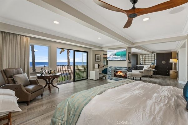 Bedroom, Fireplace, Interior, Recessed Lighting, Water, Wood Texture Flooring