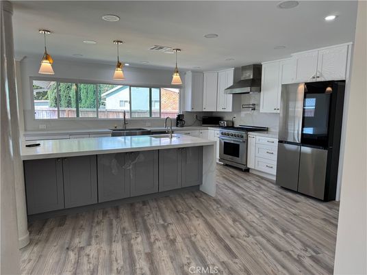 Interior, Kitchen, Pendant Lights, Recessed Lighting, Stainless Steel Appliances, Wood Texture Flooring