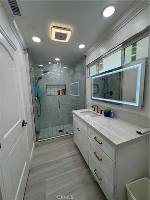 Bathroom, Dual Sink Vanities, Glass Shower, Interior, Marble Walls, Recessed Lighting