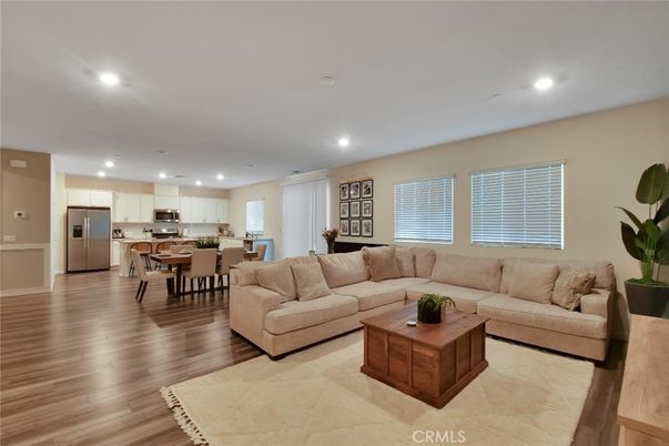 Dining room, Interior, Kitchen, Living room, Recessed Lighting, Stainless Steel Appliances, Wood Texture Flooring
