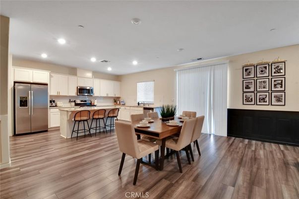 Dining room, Interior, Kitchen, Recessed Lighting, Stainless Steel Appliances, Wood Texture Flooring