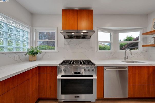 Interior, Kitchen, Marble Walls, Stainless Steel Appliances, Wood Texture Flooring