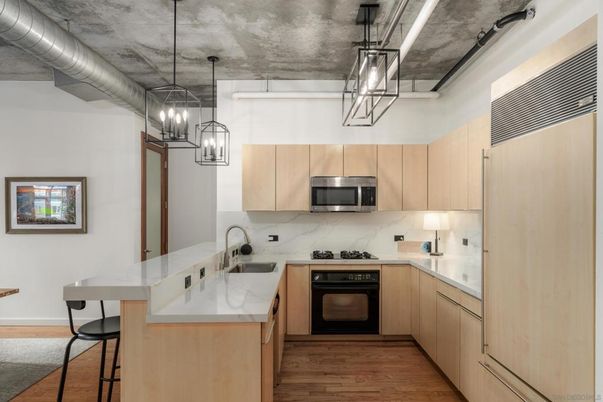 Interior, Kitchen, Marble Walls, Pendant Lights, Stainless Steel Appliances, Wood Texture Flooring