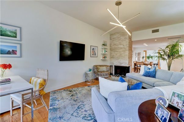 Dining room, Fireplace, Interior, Living room, Pendant Lights, Recessed Lighting, Stone Walls, Wood Texture Flooring