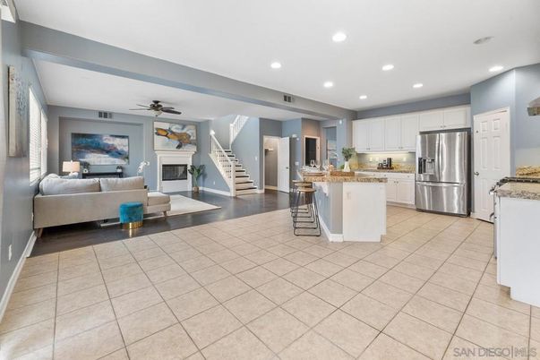 Fireplace, Interior, Kitchen, Living room, Recessed Lighting, Stainless Steel Appliances