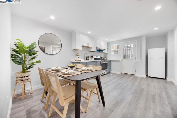 Dining room, Interior, Kitchen, Recessed Lighting, Stainless Steel Appliances, Wood Texture Flooring