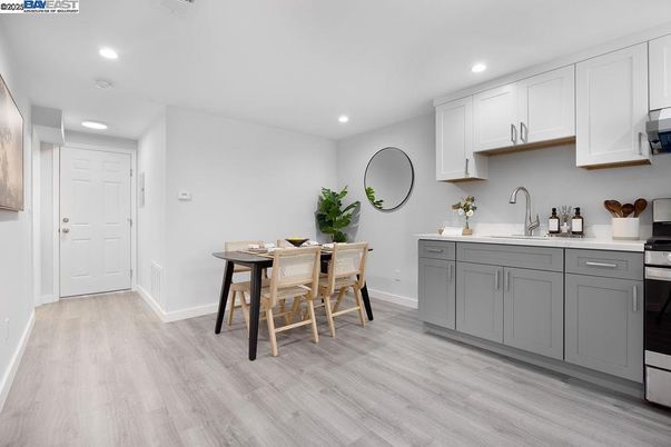 Dining room, Interior, Kitchen, Recessed Lighting, Stainless Steel Appliances, Wood Texture Flooring