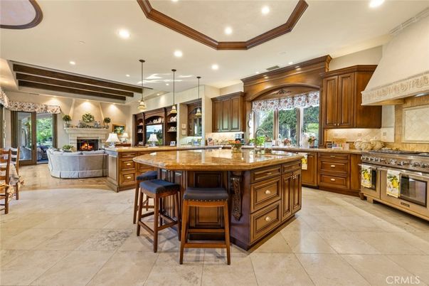 Fireplace, Interior, Kitchen, Living room, Pendant Lights, Recessed Lighting, Stainless Steel Appliances