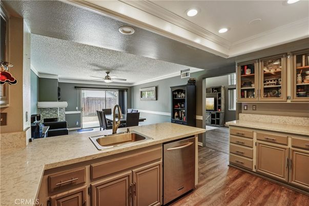 Dining room, Fireplace, Interior, Kitchen, Recessed Lighting, Wood Texture Flooring