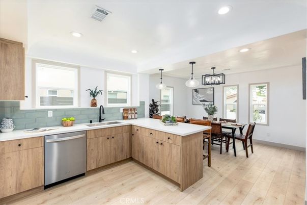 Dining room, Interior, Kitchen, Pendant Lights, Recessed Lighting, Stainless Steel Appliances, Wood Texture Flooring