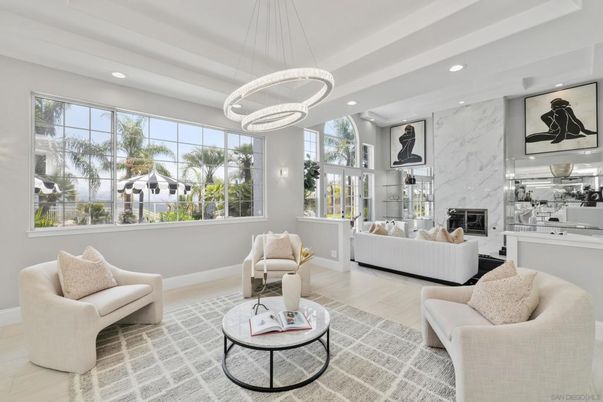 Fireplace, Interior, Living room, Marble Walls, Pendant Lights, Recessed Lighting, Wood Texture Flooring