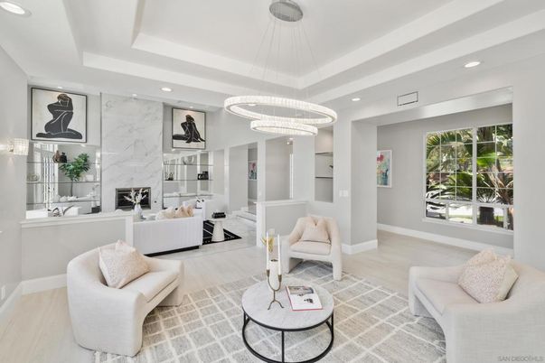 Fireplace, Interior, Living room, Marble Walls, Pendant Lights, Recessed Lighting, Wood Texture Flooring