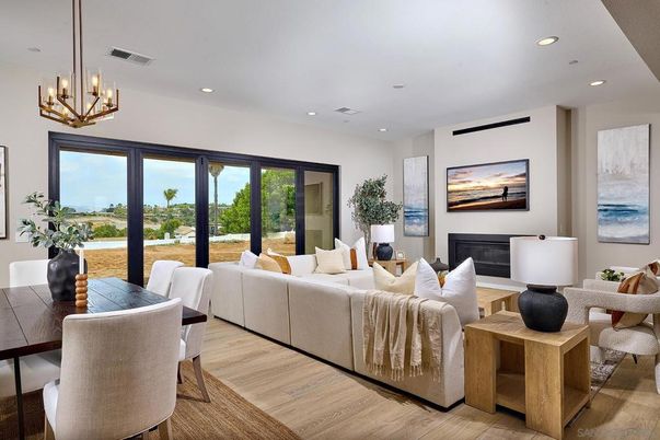 Dining room, Fireplace, Interior, Living room, Pendant Lights, Recessed Lighting, Wood Texture Flooring