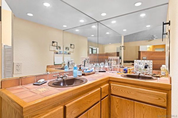 Bathroom, Dual Sink Vanities, Interior, Recessed Lighting, Tile Countertops