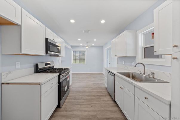 Interior, Kitchen, Recessed Lighting, Stainless Steel Appliances, Wood Texture Flooring
