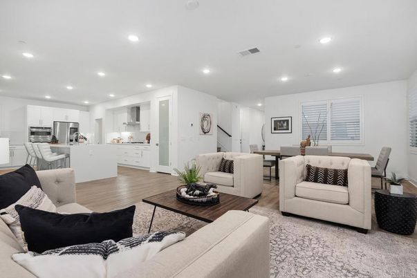 Dining room, Interior, Kitchen, Living room, Recessed Lighting, Stainless Steel Appliances, Wood Texture Flooring