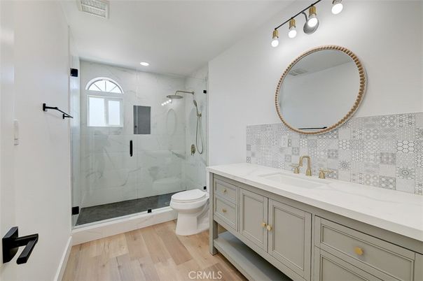 Bathroom, Glass Shower, Interior, Marble Walls, Recessed Lighting, Wood Texture Flooring
