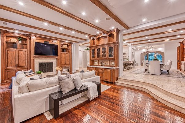 Chandelier, Dining room, Fireplace, Interior, Living room, Recessed Lighting, Wooden Beams, Wood Texture Flooring