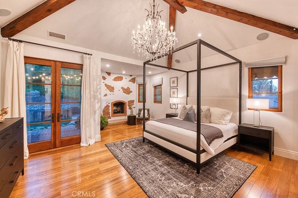 Bedroom, Chandelier, Fireplace, Interior, Recessed Lighting, Wooden Beams, Wood Texture Flooring