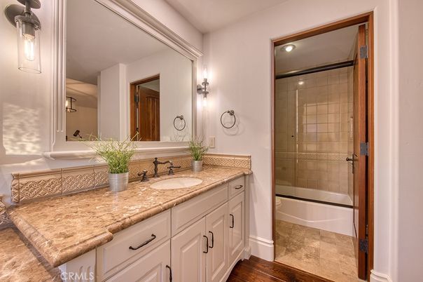 Bathroom, Dual Sink Vanities, Glass Shower, Interior, Wood Texture Flooring