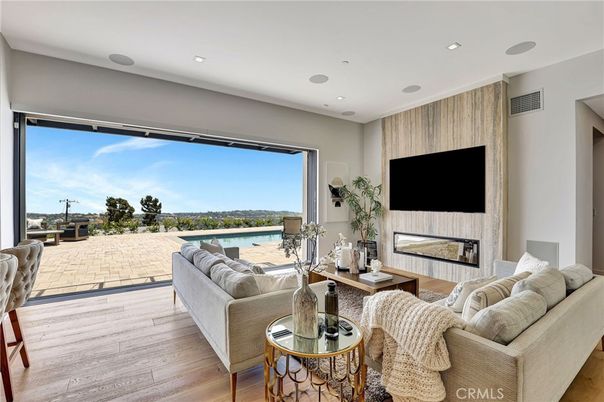 Fireplace, Interior, Living room, Recessed Lighting, Water, Wood Texture Flooring