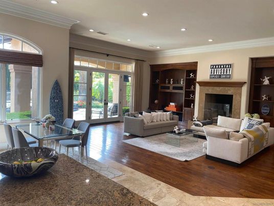 Dining room, Fireplace, Interior, Living room, Recessed Lighting, Wood Texture Flooring