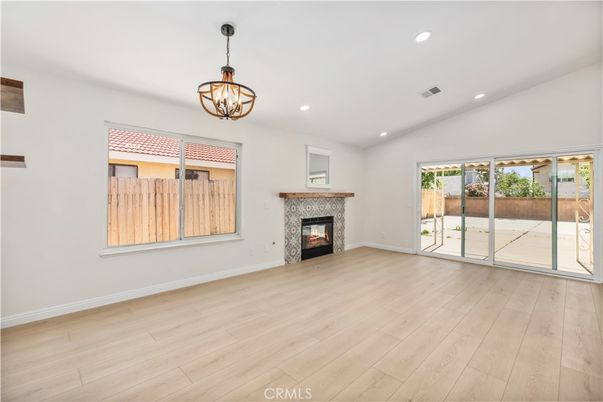 Chandelier, Empty room, Fireplace, Interior, Recessed Lighting, Wood Texture Flooring
