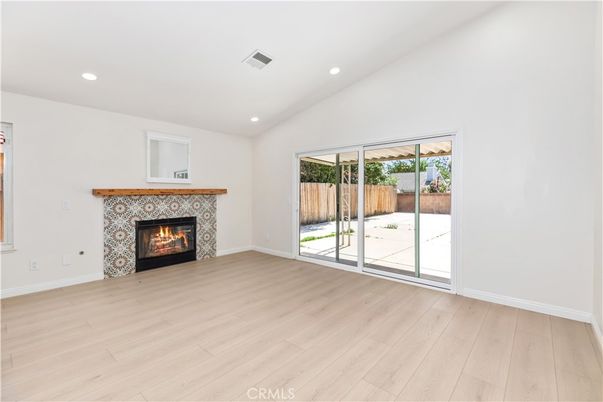 Empty room, Fireplace, Interior, Recessed Lighting, Wood Texture Flooring