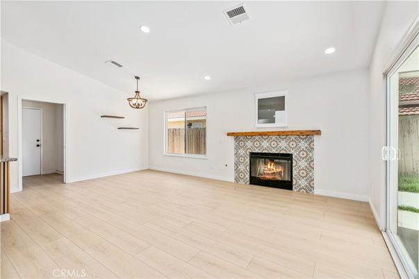 Empty room, Fireplace, Interior, Pendant Lights, Recessed Lighting, Wood Texture Flooring