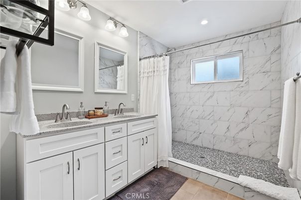 Bathroom, Dual Sink Vanities, Interior, Marble Walls, Recessed Lighting