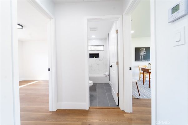 Bathroom, Interior, Marble Walls, Recessed Lighting, Wood Texture Flooring