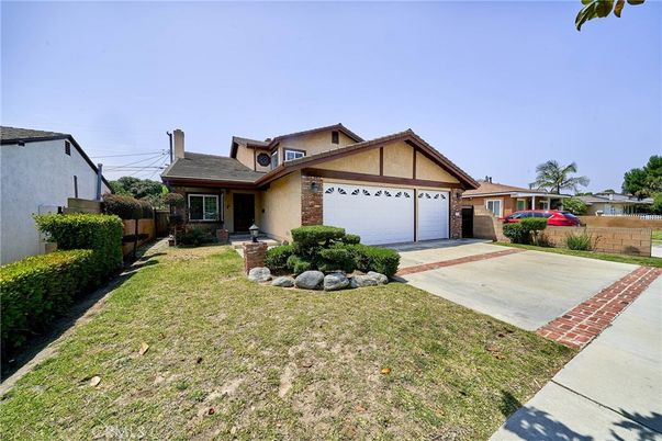 Attached, Backyard, Exterior, Facade, Brick Facade, Tudor Revival