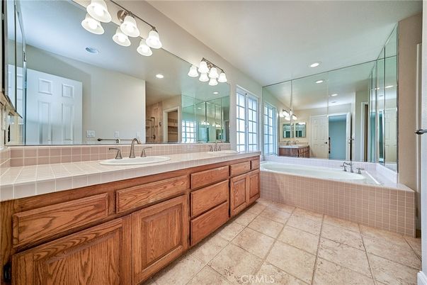 Bathroom, Dual Sink Vanities, Glass Shower, Interior, Recessed Lighting, Tile Countertops