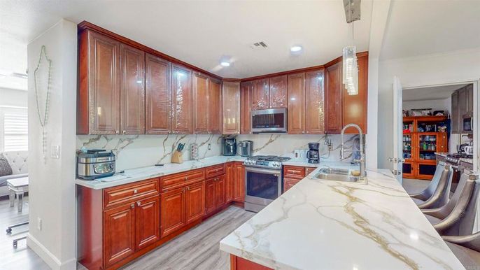 Interior, Kitchen, Pendant Lights, Recessed Lighting, Stainless Steel Appliances, Wood Texture Flooring