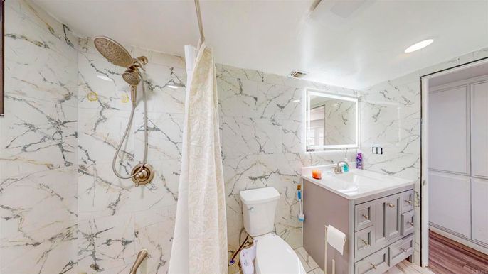 Bathroom, Interior, Marble Walls, Recessed Lighting, Wood Texture Flooring