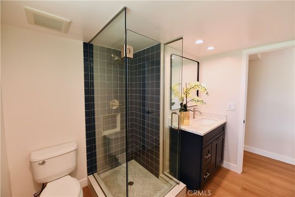 Bathroom, Glass Shower, Interior, Recessed Lighting, Wood Texture Flooring