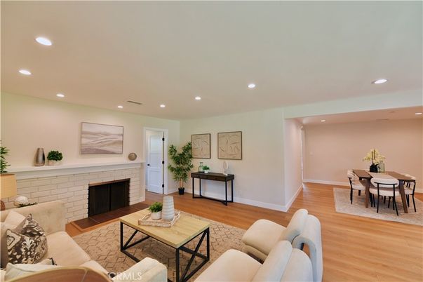 Dining room, Fireplace, Interior, Living room, Recessed Lighting, Wood Texture Flooring