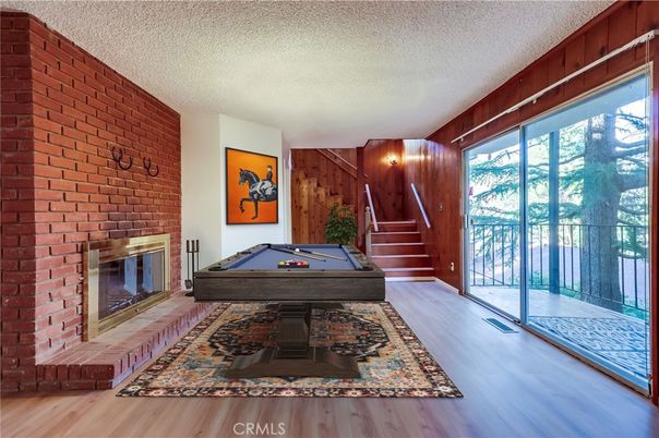 Billiard Table, Fireplace, Game Room, Interior, Stone Walls, Wood Texture Flooring, Wooden Walls