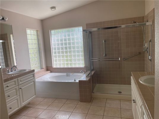 Bathroom, Dual Sink Vanities, Glass Shower, Interior, Recessed Lighting, Tile Countertops