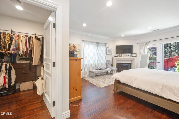 Bedroom, Fireplace, Interior, Recessed Lighting, Wood Texture Flooring