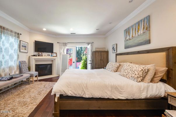 Bedroom, Fireplace, Interior, Recessed Lighting, Wood Texture Flooring
