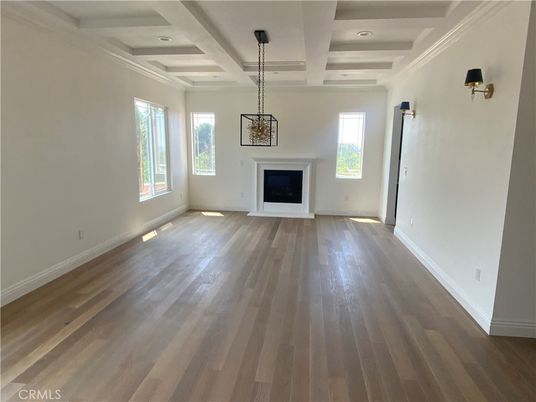 Empty room, Fireplace, Interior, Pendant Lights, Recessed Lighting, Wood Texture Flooring