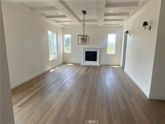 Empty room, Fireplace, Interior, Pendant Lights, Recessed Lighting, Wood Texture Flooring