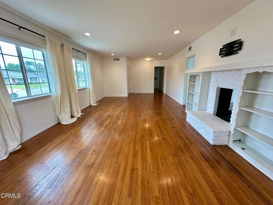 Empty room, Fireplace, Interior, Recessed Lighting, Wood Texture Flooring