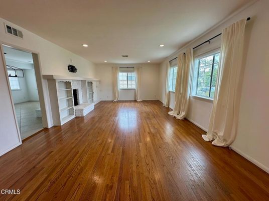 Empty room, Fireplace, Interior, Recessed Lighting, Wood Texture Flooring