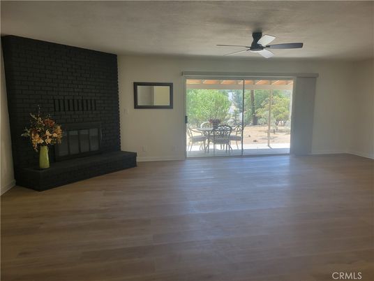 Empty room, Fireplace, Interior, Stone Walls, Wood Texture Flooring