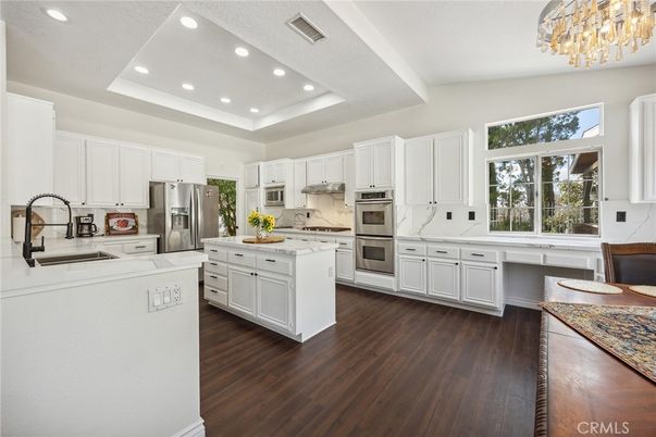 Chandelier, Interior, Kitchen, Recessed Lighting, Stainless Steel Appliances, Wood Texture Flooring