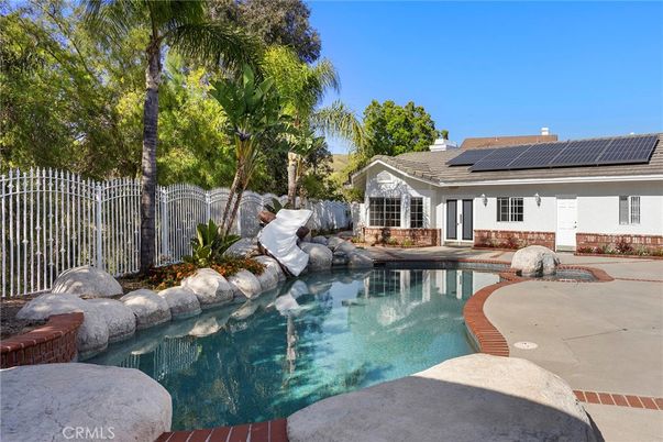 Exterior, Pool, Solar Panels